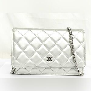 586 Chanel WOC silver crossbody